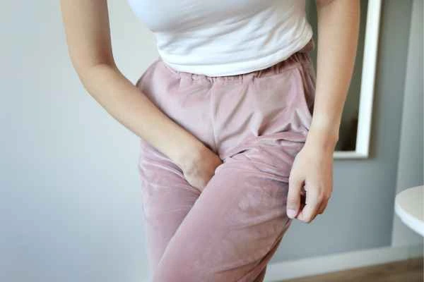 older woman running to the toilet because of urinary incontinence Brierley Hill